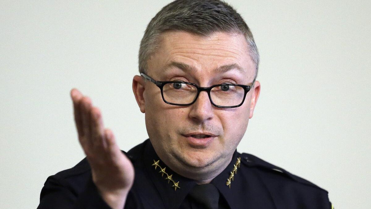 Then-Oakland Chief of Police Sean Whent speaks during a news conference in Oakland on May 13, 2016.