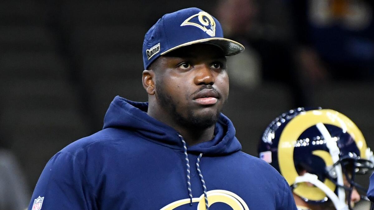 Rams offensive tackle Greg Robinson looks on during a game against the Saints in 2016 in which he did not suit-up.