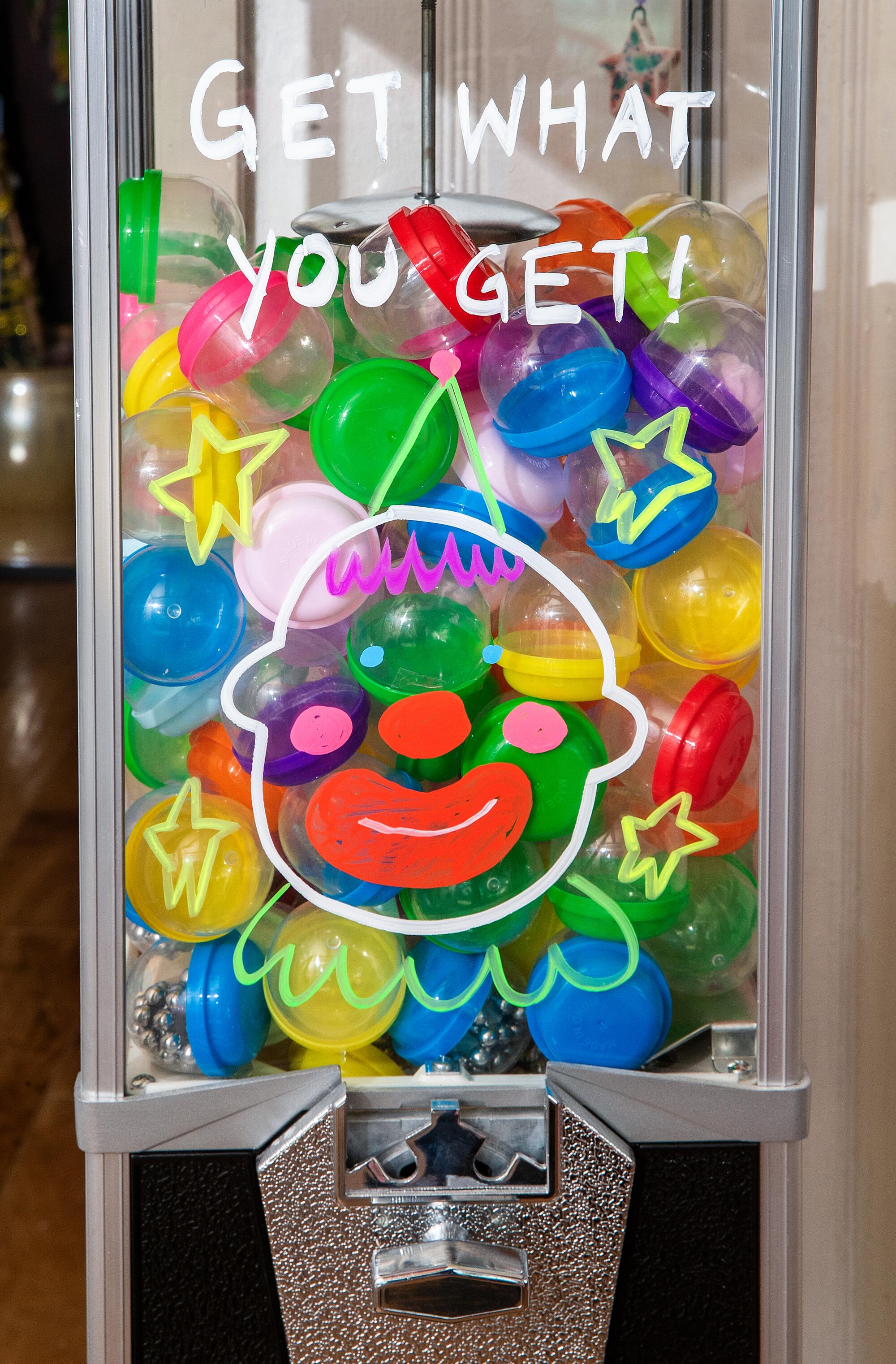 A "Get What You Get" dispenser is located at Yousefi's home studio.