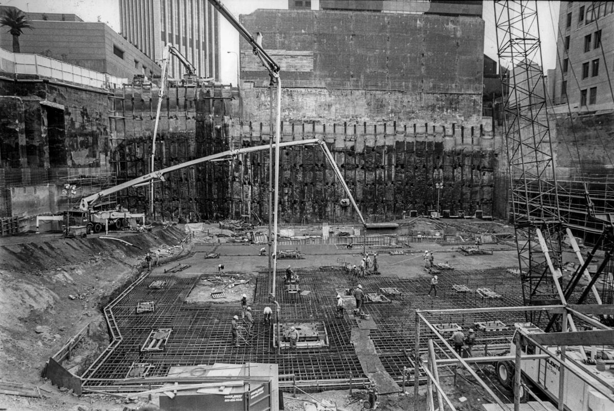 Jan. 30, 1988: Construction of the Library Tower begins with a 15-hour concrete pour of the foundation.