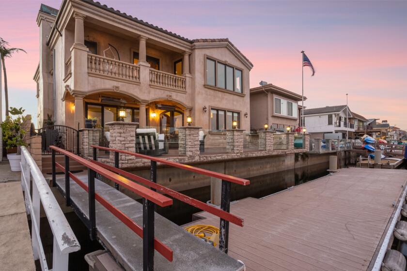 Found on Davenport Island, the waterfront home comes with a private dock overlooking Huntington Beach Harbor.