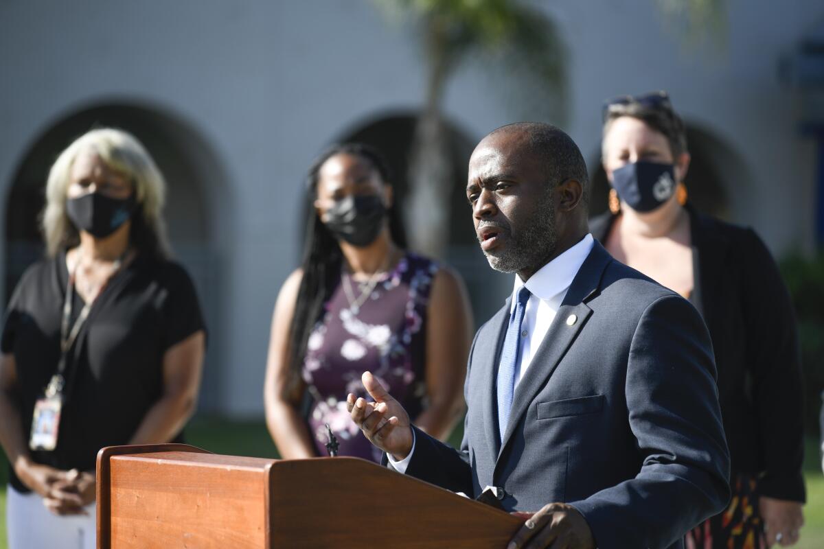 State Superintendent of Public Instruction Tony Thurmond speaks behind podium.