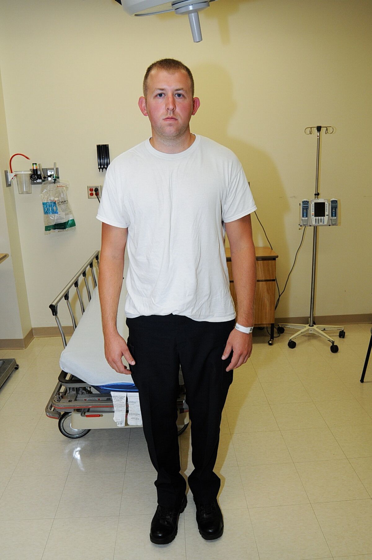 Photos made available after the grand jury announcement on Monday night show Ferguson police officer Darren Wilson after being involved in the shooting death of 18-year-old Michael Brown on Aug. 9.---Photos by St. Louis County Prosecutors office