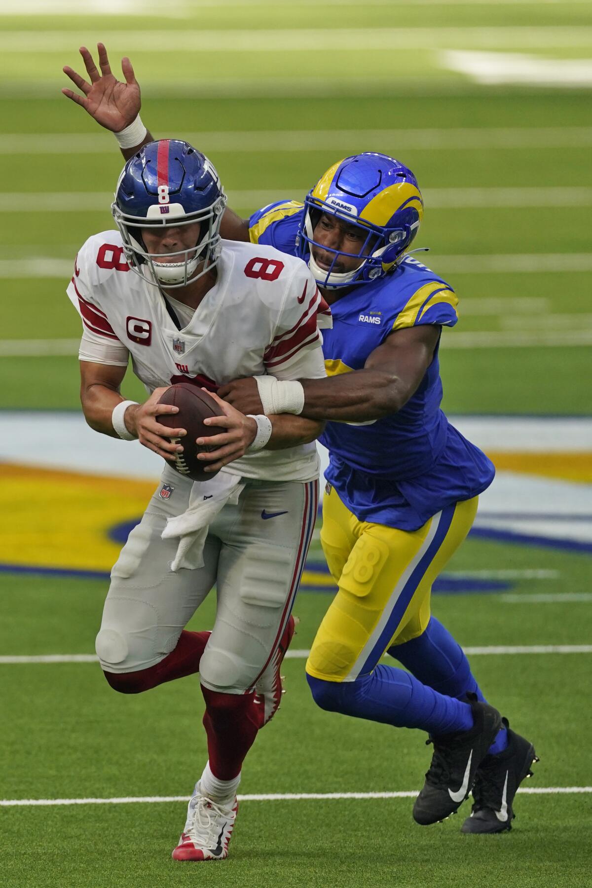 Linebacker (58) Justin Hollins of the Los Angeles Rams against the