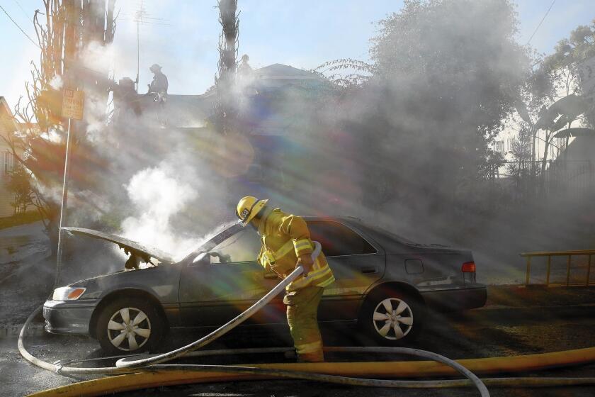 Los Angeles County firefighters at work. A Times investigation last fall found that at least 13% of county firefighters were related to current or former members of the department.