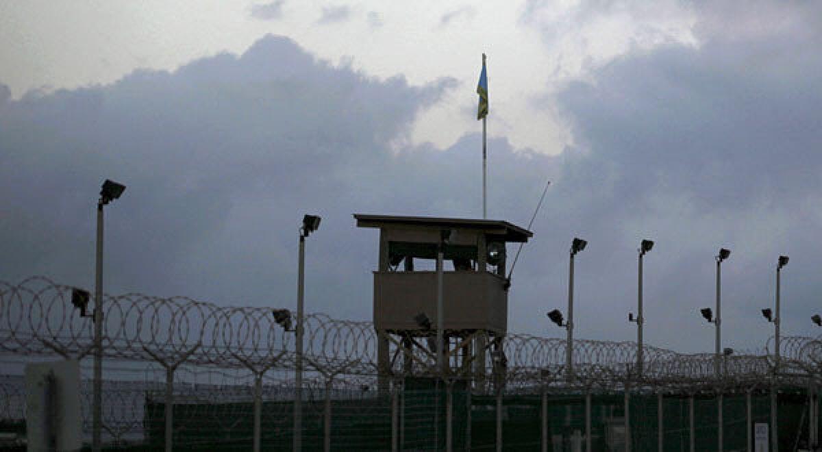 A guard tower in front of Guantanamo Bay U.S. Naval Base.