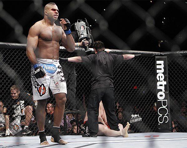 Alistair Overeem is declared the winner by technical knockout over Brock Lesnar in the first round of their heavyweight fight at UFC 141 on Friday night at the MGM Grand Garden Arena in Las Vegas.