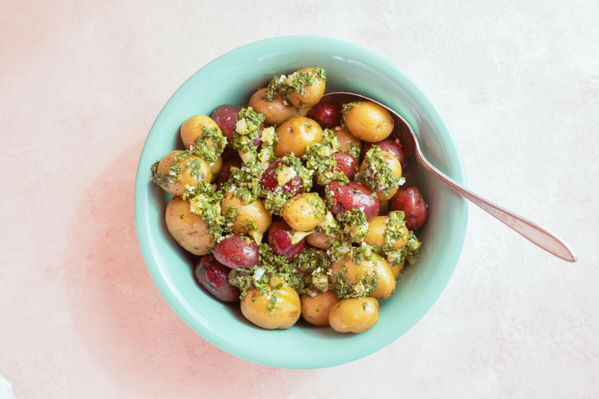 New potatoes with chopped lemon and mint gremolata