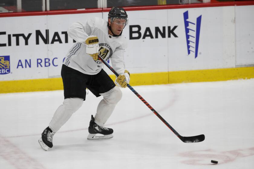 Vegas Golden Knights center Paul Stastny (26) practices during an NHL hockey summer training camp as the NHL reopens during the coronavirus Tuesday, July 14, 2020, in Las Vegas. (AP Photo/John Locher)