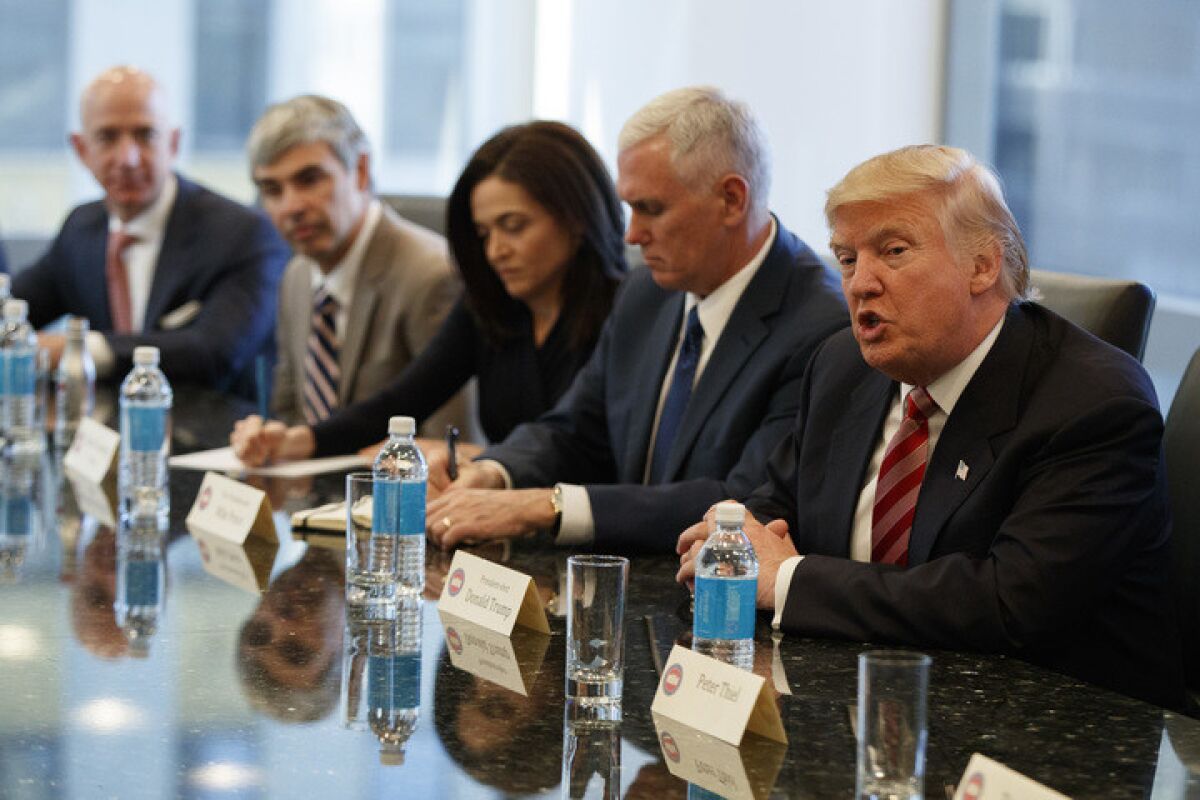 President-elect Donald Trump and and Vice President-elect Mike Pence met Wednesday with technology industry leaders, including, from left, Amazon founder Jeff Bezos, Alphabet Chief Executive Larry Page and Facebook Chief Operating Officer Sheryl Sandberg.