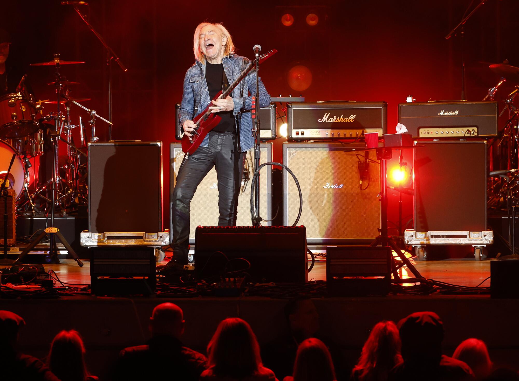 Joe Walsh performs during the VetsAid 2023 concert on Sunday.