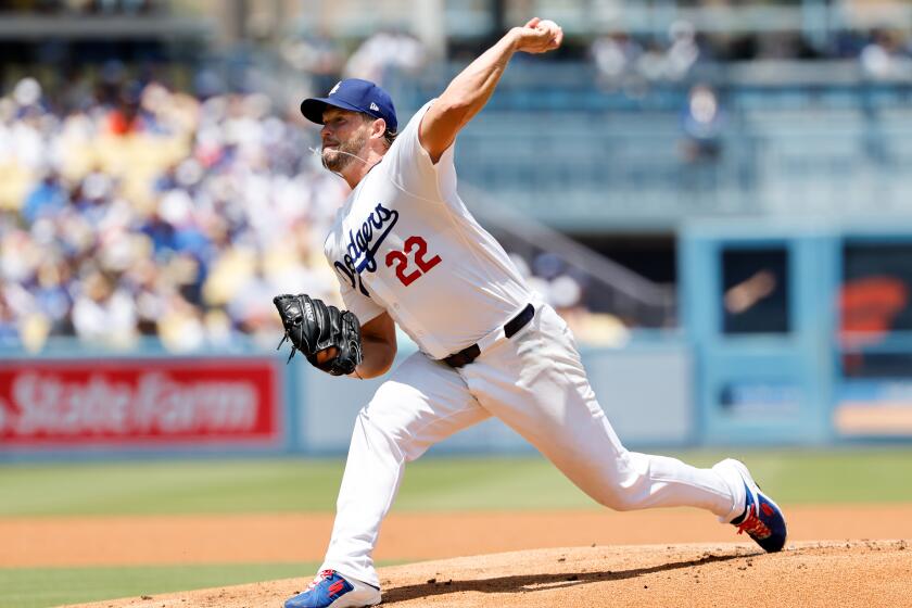 LOS ANGELES, CA - JULY 25, 2024: Los Angeles Dodgers starting pitcher Clayton Kershaw (22) delivers a pitch during the first inning against the San Francisco Giants at Dodgers Stadium on July 25, 2024 in Los Angeles, California.(Gina Ferazzi / Los Angeles Times)