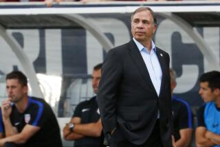FILE- In this June 8, 2017, file photo, United States coach Bruce Arena watches.
