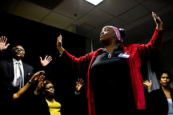 Ericka Tillis directs Oakland's Havenscourt Community Church choir as they rehearse for the competition at Oracle Arena in the Bay Area.