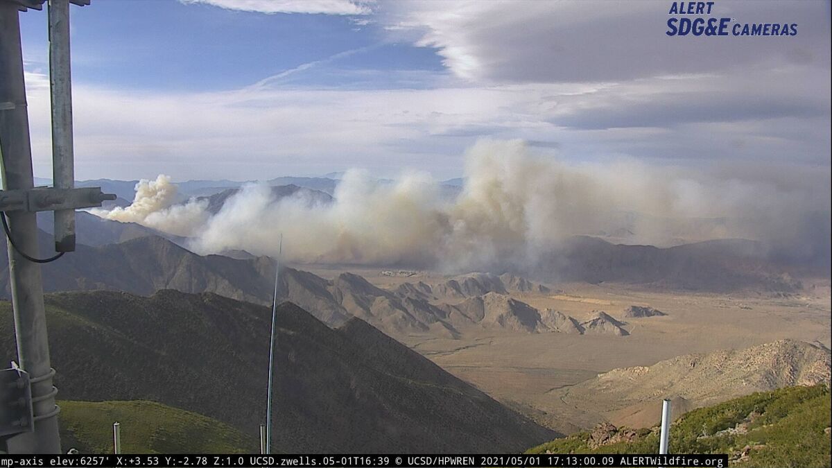 SDG&E cameras show smoke from a fire burning near Shelter Valley on Saturday.