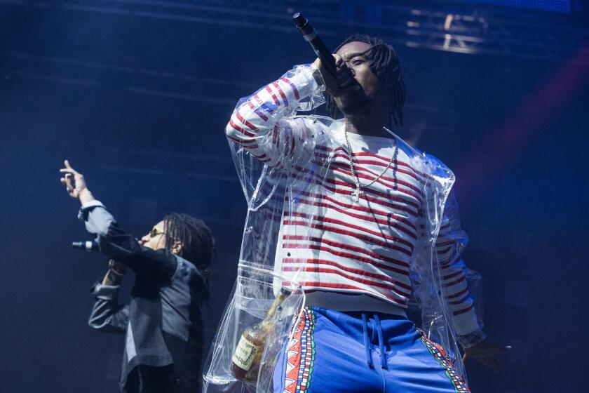 Rae Sremmurd's Swae Lee, left, and brother Slim Jxmmi perform at the Coachella Valley Music and Arts Festival on April 15.