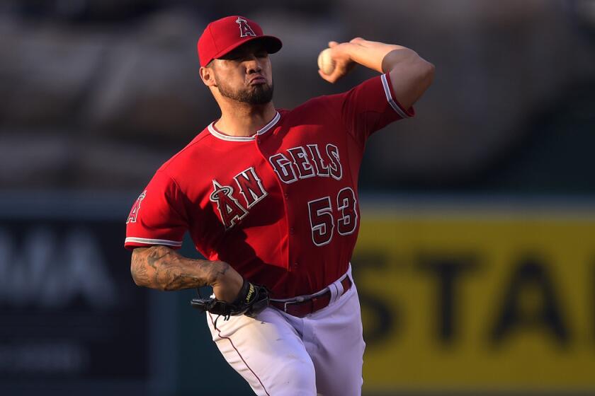 Angels pitcher Hector Santiago delivers a pitch against the A's during his strong start last Tuesday.