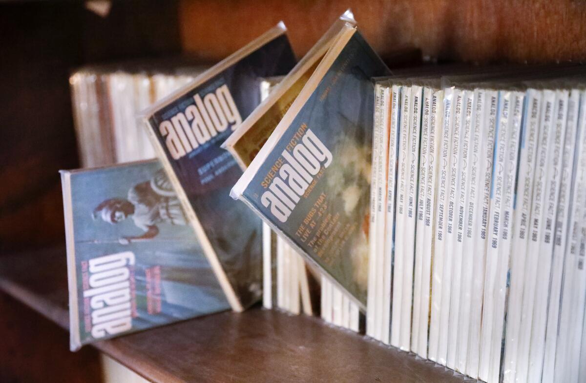 Copies of Analog Science Fiction and Fact Magazine from the 1960s are in a bookcase at the home of Gideon Marcus of Vista. He is a space historian and writes the blog, Galactic Journey, that's written as if it takes place 55 years to the day in the past. He also has low-power AM and FM radio stations, as well as a TV station that broadcasts programs from October 1964.