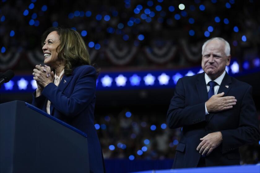 Democratic presidential nominee Vice President Kamala Harris and her running mate Minnesota Gov. Tim Walz speak at a campaign rally in Philadelphia, Tuesday, Aug. 6, 2024. (AP Photo/Matt Rourke)