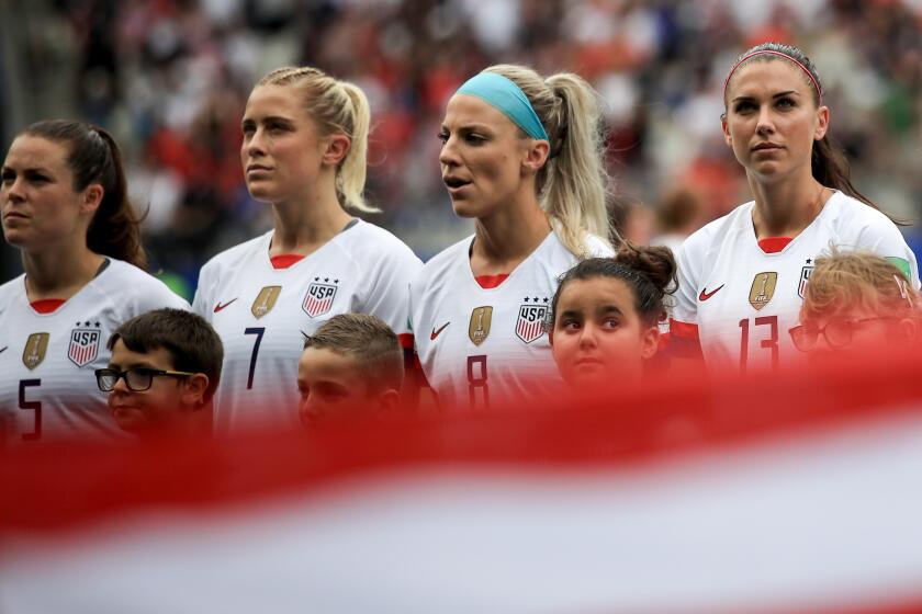 REIMS, FRANCE - JUNE 24: USA players look on during the national anthem during the 2019 FIFA Women's World Cup France Round Of 16 match between Spain and USA at Stade Auguste Delaune on June 24, 2019 in Reims, France. (Photo by Marc Atkins/Getty Images)