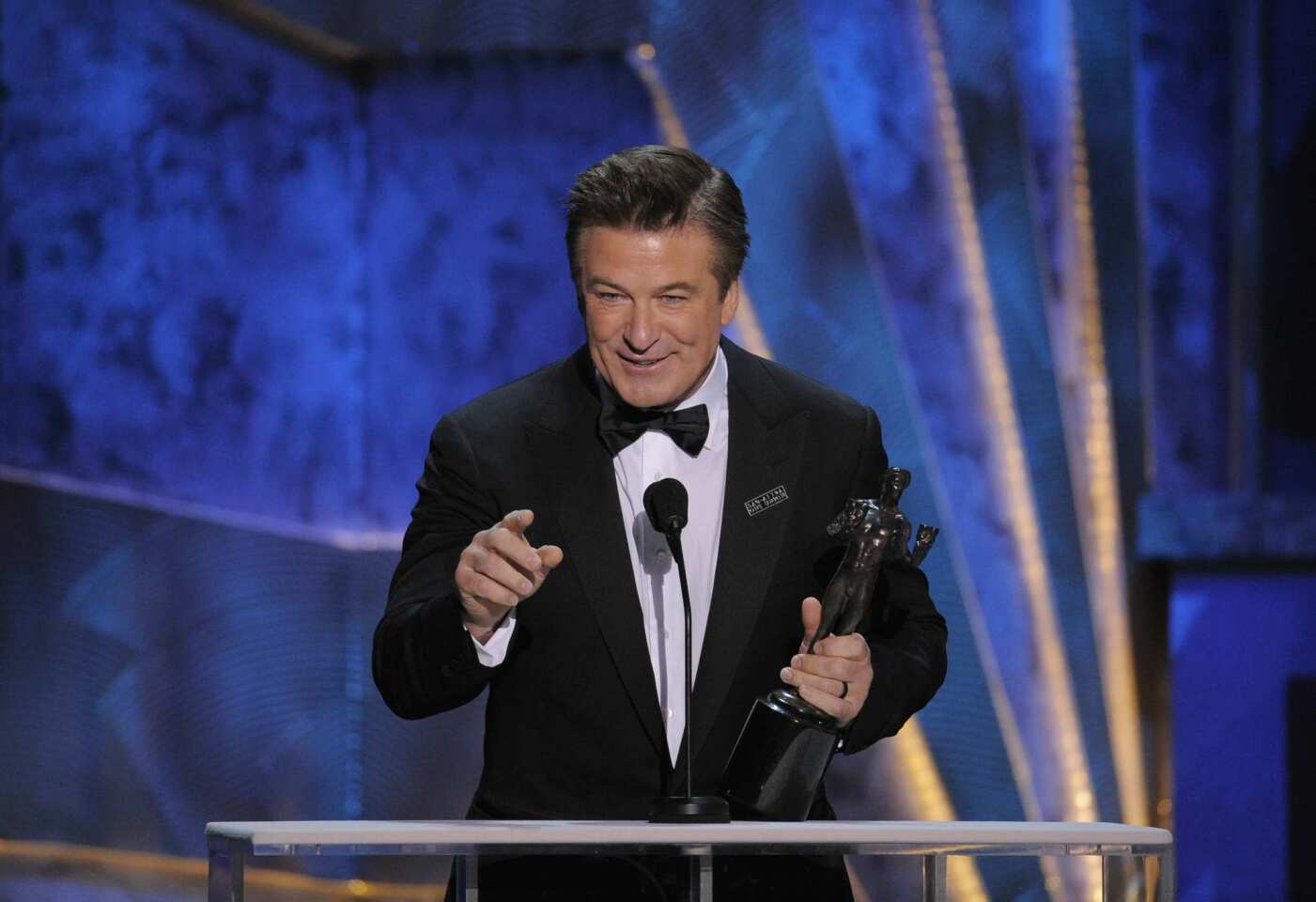 Alec Baldwin puts the emphasis elsewhere