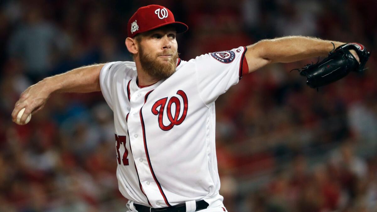 Washington Nationals pitcher Stephen Strasburg throws against the Chicago Cubs in Game 1 of the teams' National League Division Series on Oct. 6.