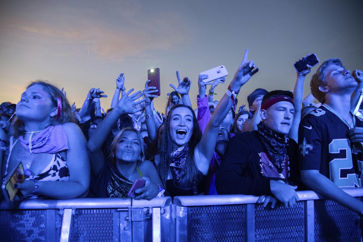 Festival-goers attend the Voodoo Music Experience in New Orleans