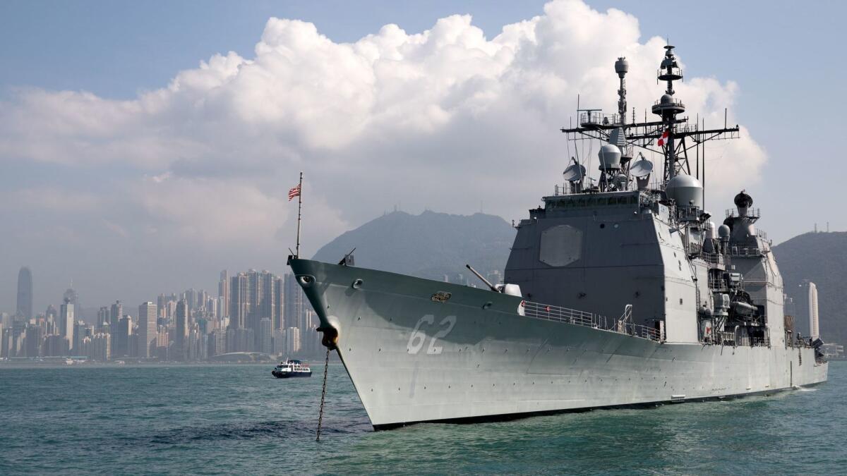 Russian warship Admiral Vinogradov and U.S. cruiser USS Chancellorsville, shown above in Hong Kong, almost collided on June 7.