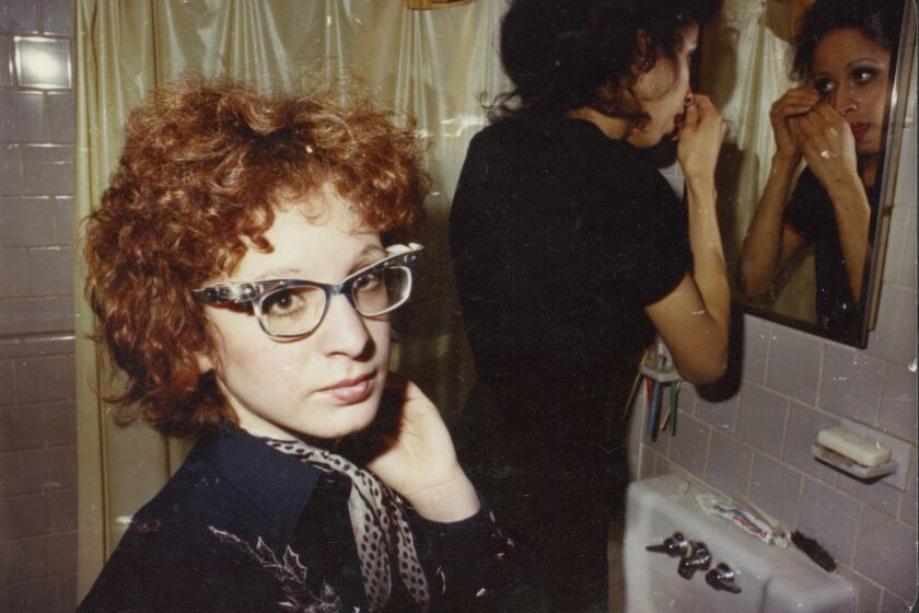 This image released by Neon shows Nan Goldin, left, and Bea Boston in an image used for the documentary "All the Beauty and the Bloodshed." (Neon via AP)