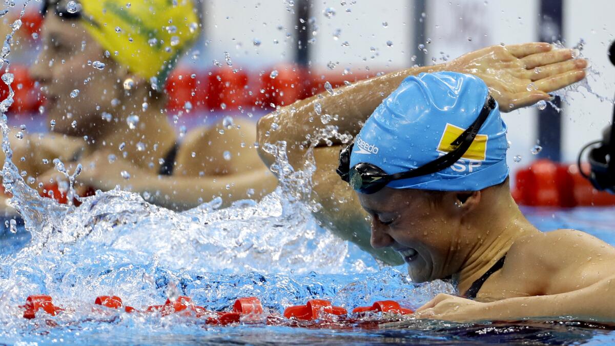 Spain's Mireia Belmonte Garcia celebrates after winning the gold in the women's 200-meter butterfly Wednesday.