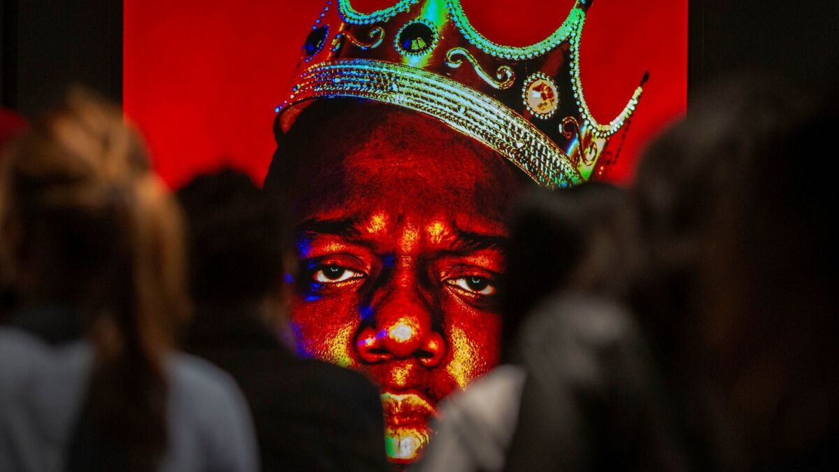Notorious B.I.G., as photographed by Barron Claiborne, on exhibit at "Contact High."