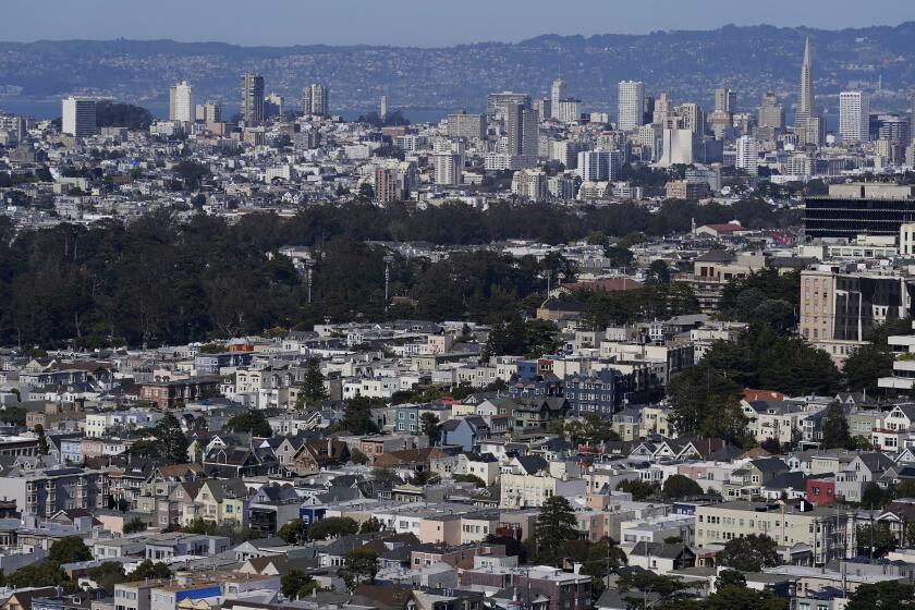 FILE - The San Francisco skyline is visible on April 26, 2023. California regulators adopted a drinking water limit on toxic hexavalent chromium. The rule is the first in the nation to specifically target the heavy metal, commonly known as chromium-6, and is expected to reduce the number of cancer and kidney disease cases from long-term ingestion, state officials say. (AP Photo/Jeff Chiu, File)