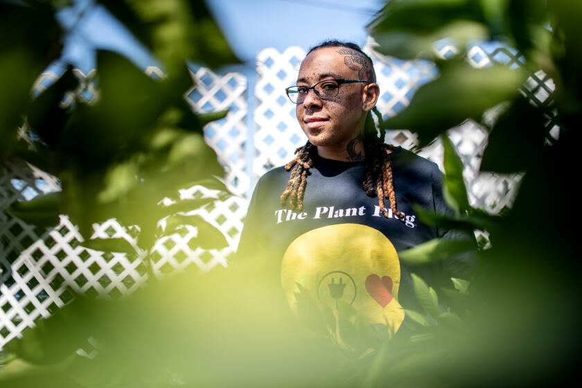 LOS ANGELES, CA - MARCH 28: Taylor Lindsey at her nursery in South Los Angeles on Tuesday, March 28, 2023 in Los Angeles, CA. Lindsey founded the Plant Plug, a curbside nursery and garden with a focus on bringing urban farming and education to Los Angeles.(Mariah Tauger / Los Angeles Times)