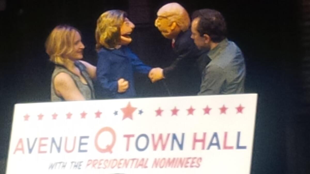 Maggie Lakis as Hillary Clinton and Rob McClure as Donald Trump in the "Avenue Q Town Hall" on Monday in New York.