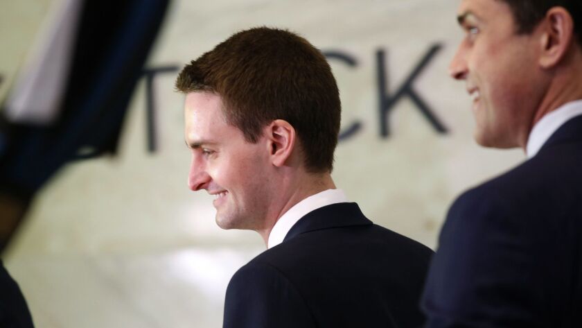 Snap Inc. CEO Evan Spiegel arrives to ring the bell at the New York Stock Exchange in 2017.