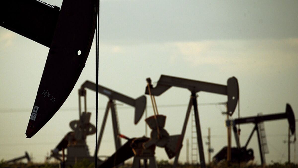 Pumpjacks work an oil field near Lovington, N.M., in the Permian Basin.