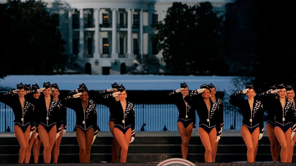 The Rockettes perform with the White House in the background in Washington in 2005.