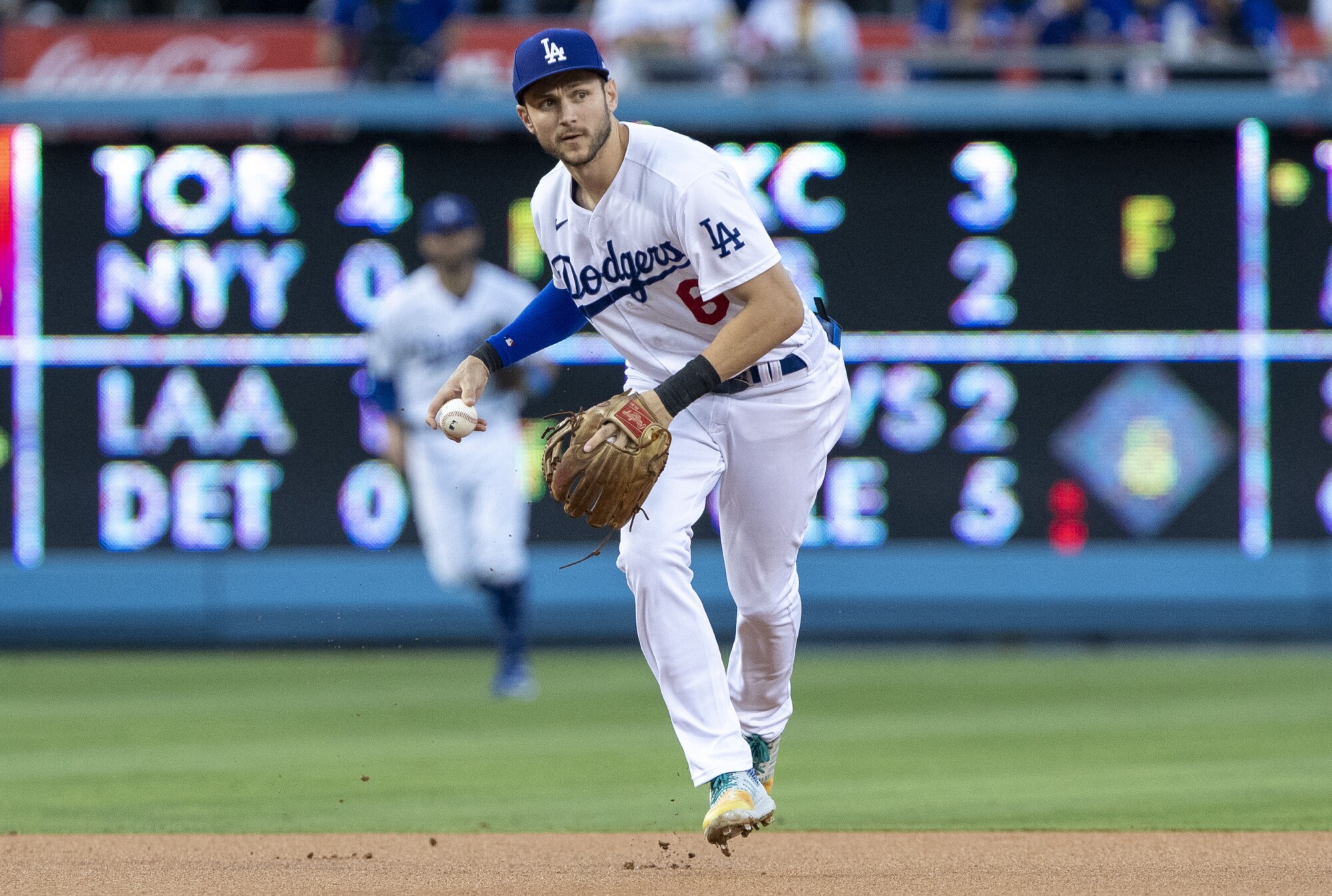 Los Angeles Dodgers shortstop Trea Turner prepares to throw out Miami Marlins' Jesus Aguilar 