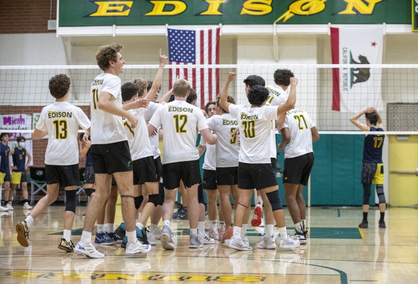 The Edison boys' volleyball team celebrates sweeping Marina in three games during a Wave League match on Thursday.