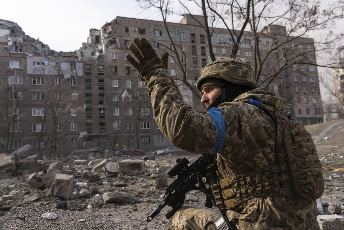 A Ukrainian serviceman guards his position.