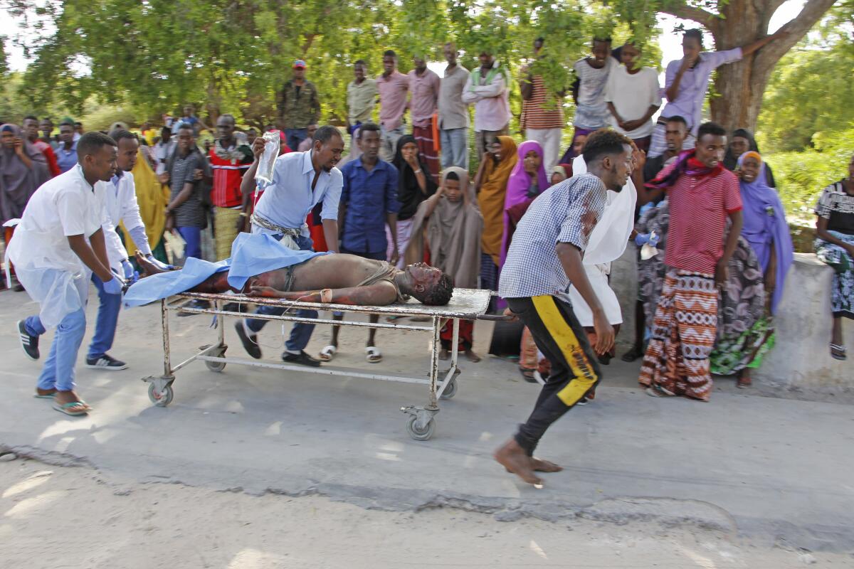 A victim of a car bombing in Mogadishu, Somalia, is taken to a hospital Saturday.