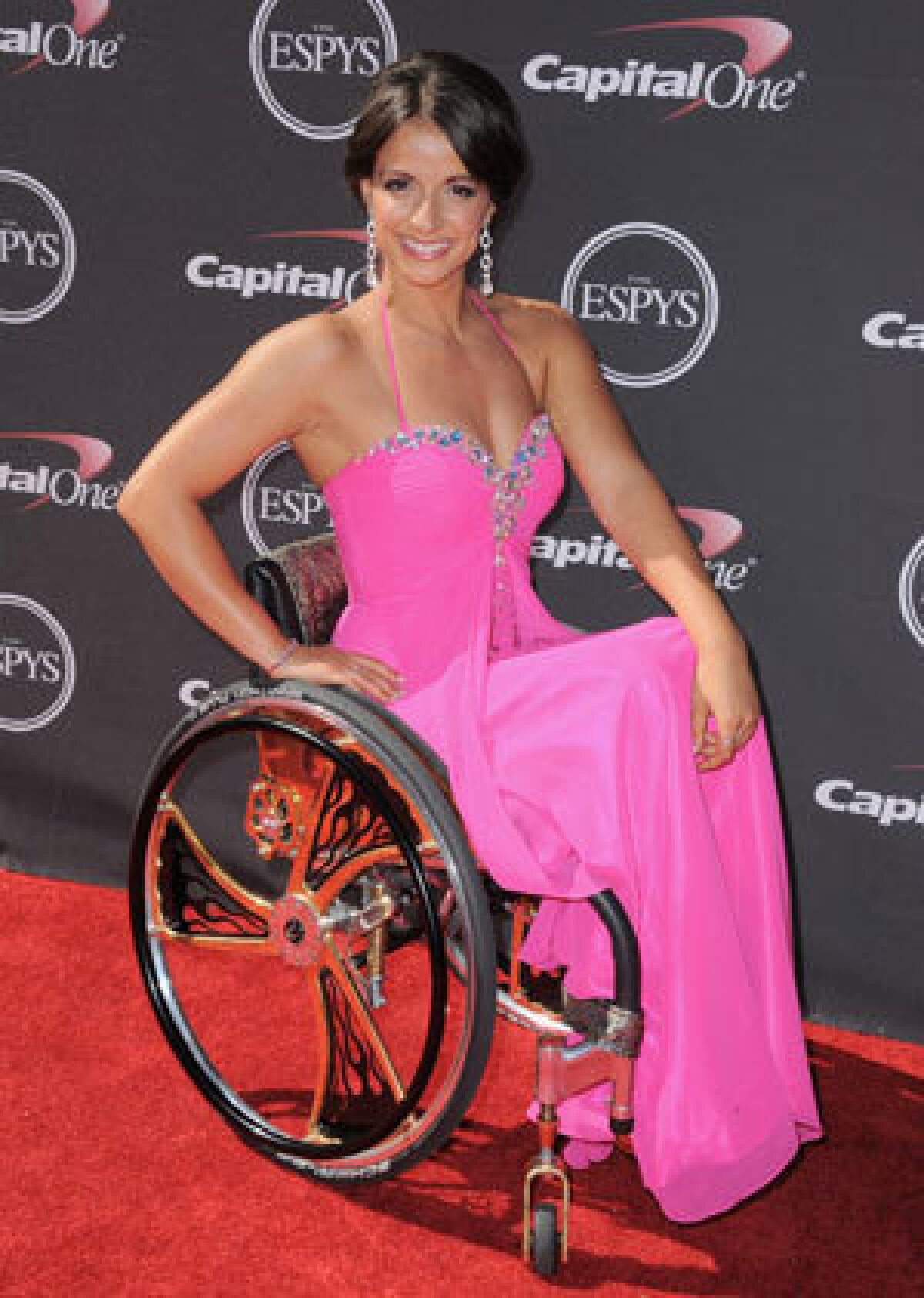 Victoria Arlen, shown at the ESPY awards earlier this year, has been banned from competing at the Paralympic world championships after the paralysis in her legs was ruled not permanent.
