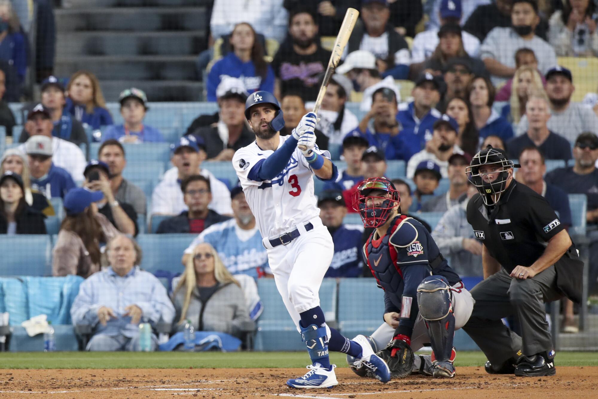  Dodgers' Chris Taylor looks up after hitting a two-run home run.