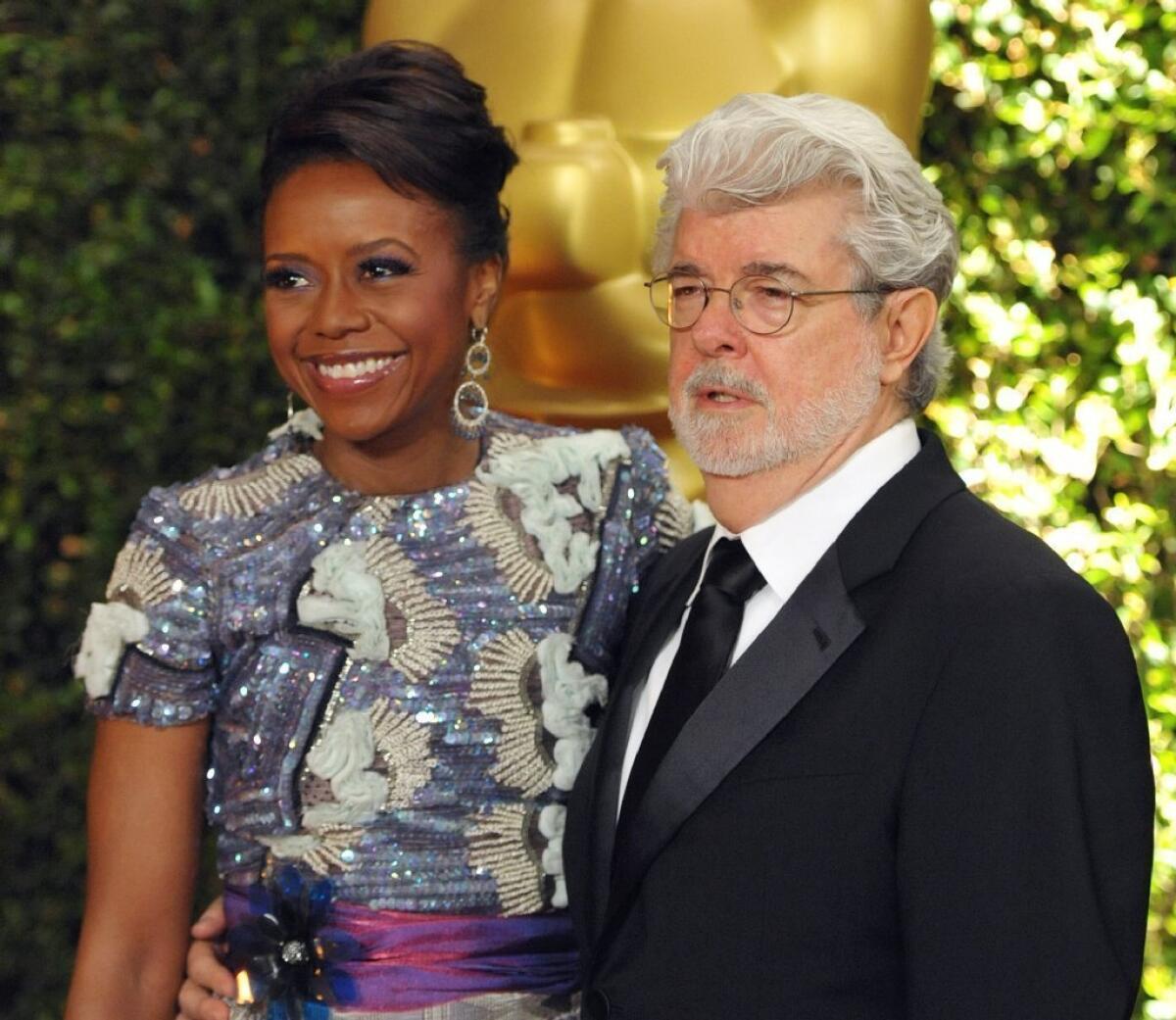 Filmmaker George Lucas and his wife, investment executive Mellody Hobson, attend an awards ceremony in Los Angeles in November; they have given $2million for an arts center for a Chicago private elementary and high school.