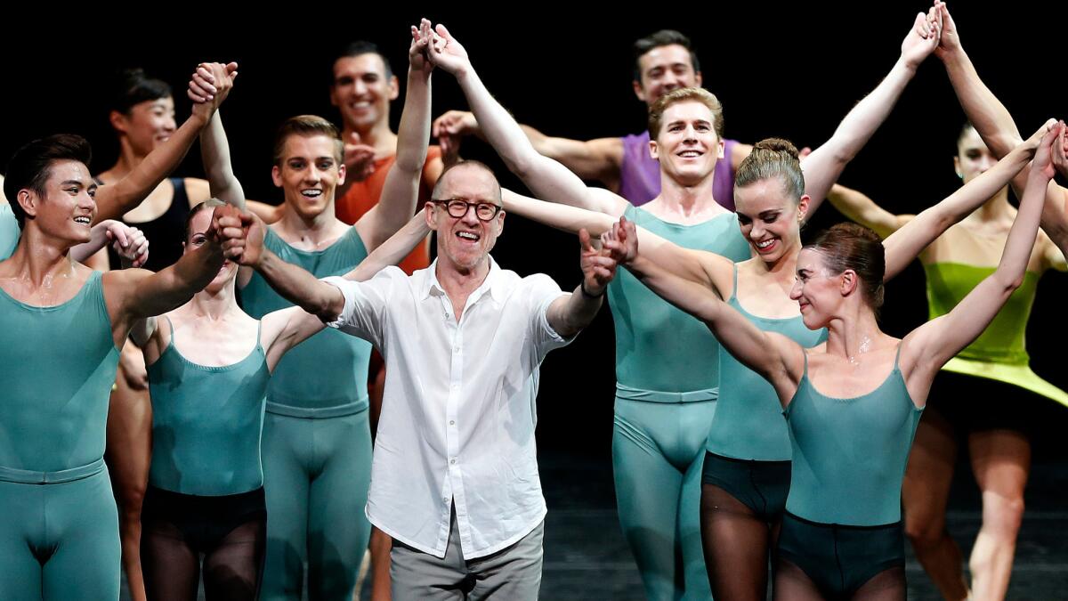 Choreographer William Forsythe, center, joins hands with members of the Houston Ballet, which danced his work with Pacific Northwest Ballet and San Francisco Ballet on Friday night at the Dorothy Chandler Pavilion in L.A.
