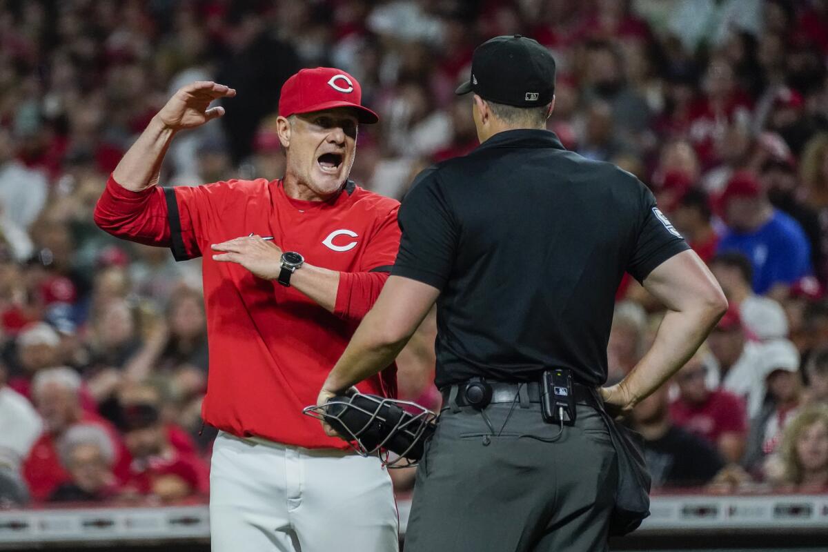 Reds drop 2 games back in wild card, lose first game of