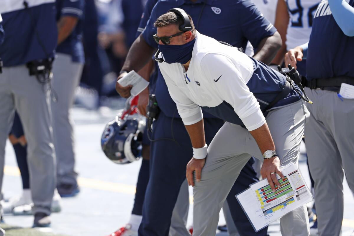 Tennessee Titans head coach Mike Vrabel watches from the sideline.