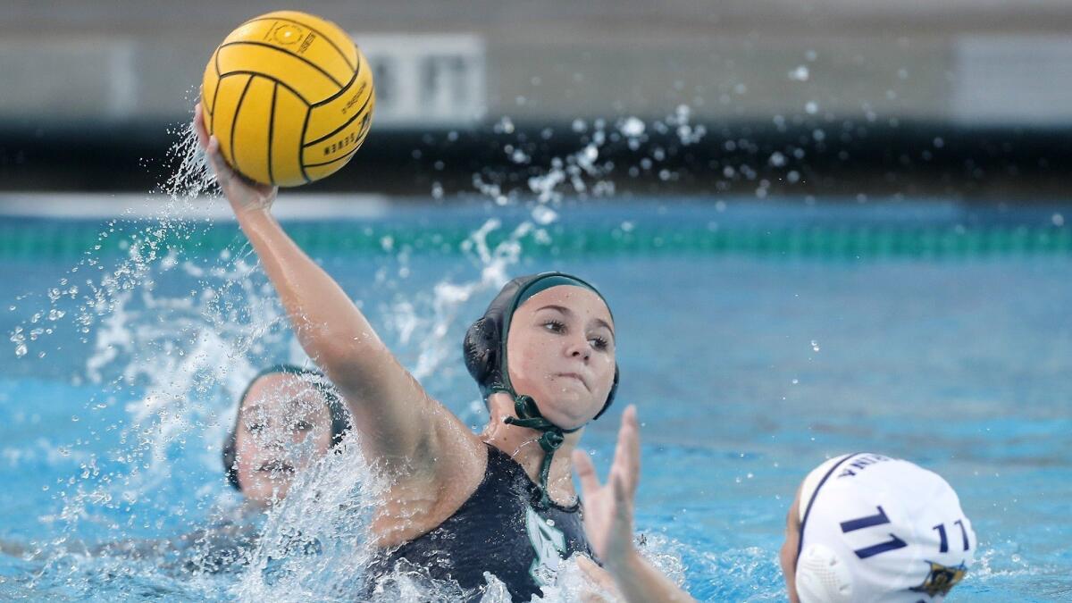 Costa Mesa High's Sofia Rice shoots against visiting Marina during the first half of a nonleague match on Dec. 12.