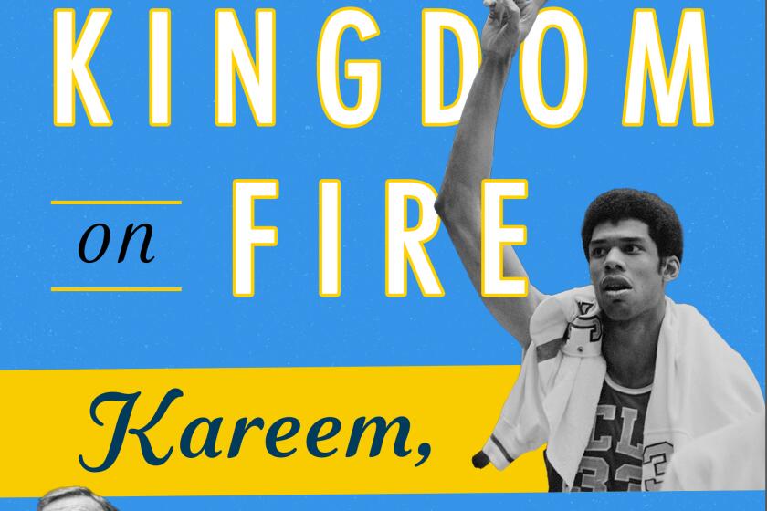 The "Kingdom of Heaven" book cover features pictures of UCLA greats Kareem Abdul-Jabbar, John Wooden and Bill Walton