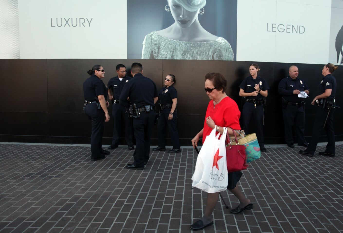 LAPD officers gather outside the Beverly Center in anticipation of a protest planned against the George Zimmerman case verdict.